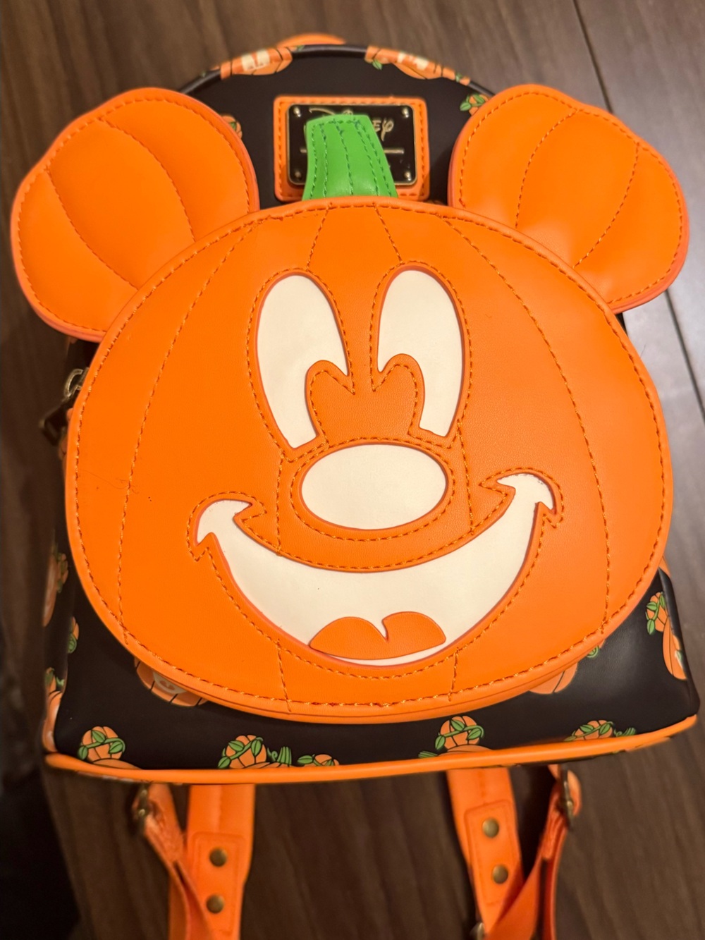 Loungefly Disney glow in-the-dark Mickey pumpkin Halloween mini backpack